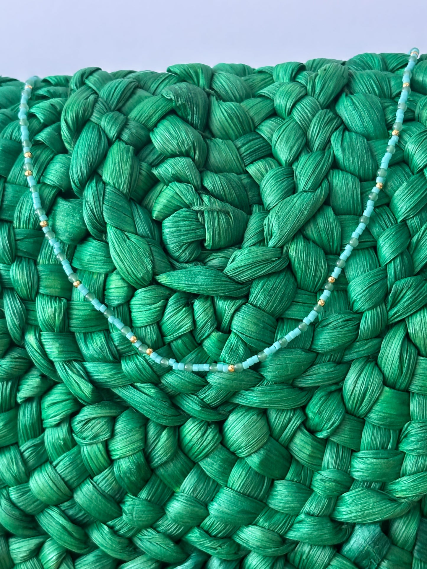 Emerald Glow Luxury Gift Set — Eco-Friendly Green Simonetta Clutch, Spongellé Edelweiss Spa Buffer & Gorjana Aventurine Necklace